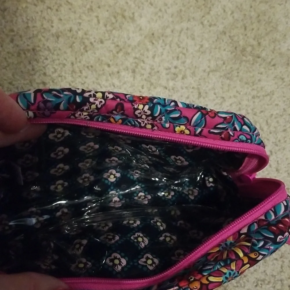 Pink Vera Bradley makeup bag.